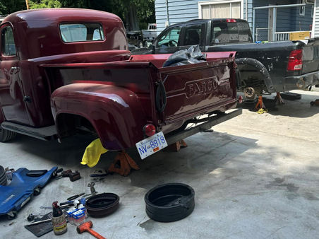 Rear brake repair in progress on a 1953 Fargo